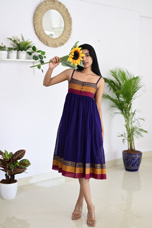 Violet Narayanpet mid-length dress featuring two side pockets and an elastic back, handcrafted from authentic handloom fabric for a blend of tradition and modern elegance.