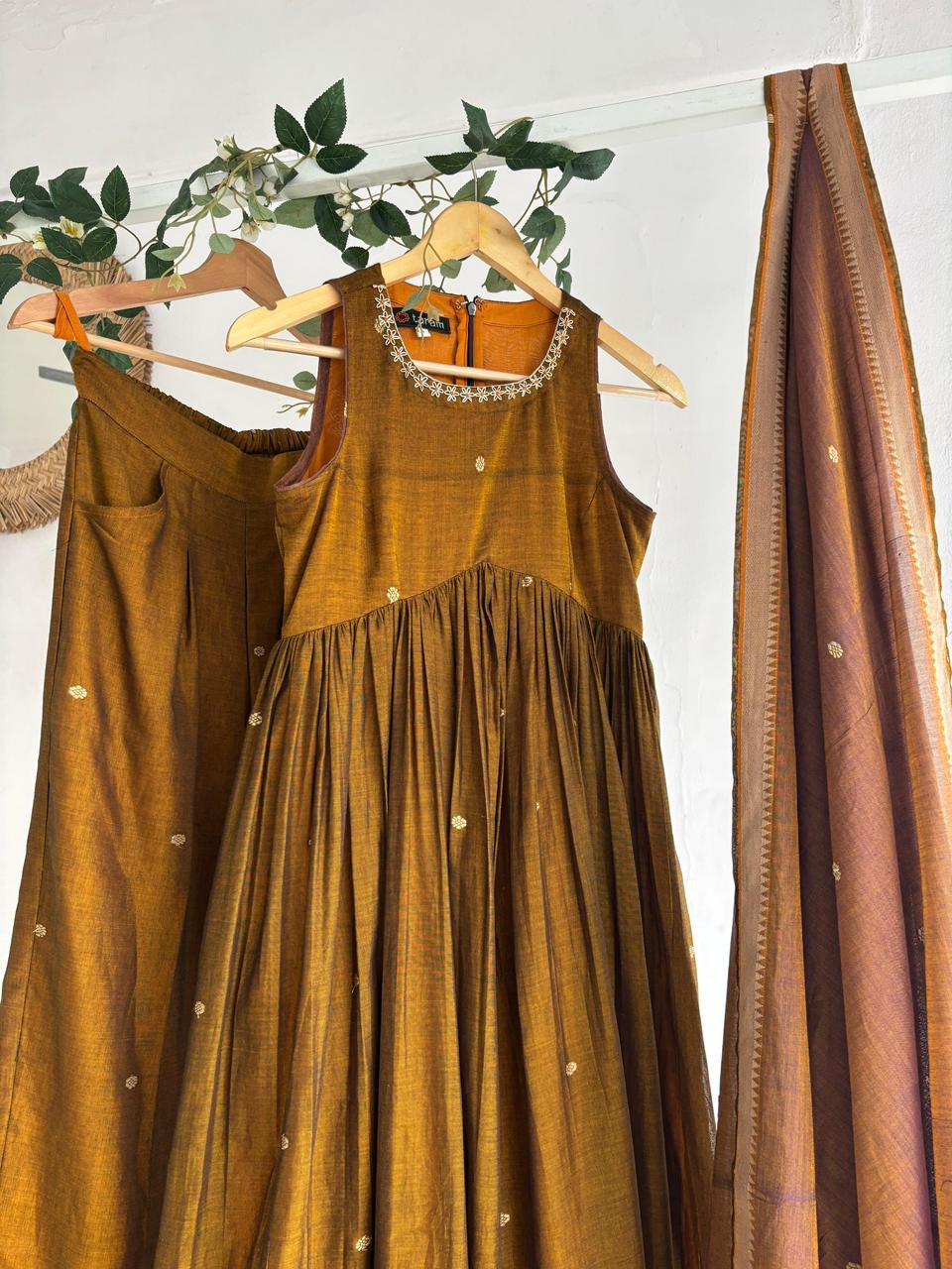 Golden Blush Narayanpet Kurta Set featuring mustard kurta, flared sharara bottoms, and pastel peach dupatta.