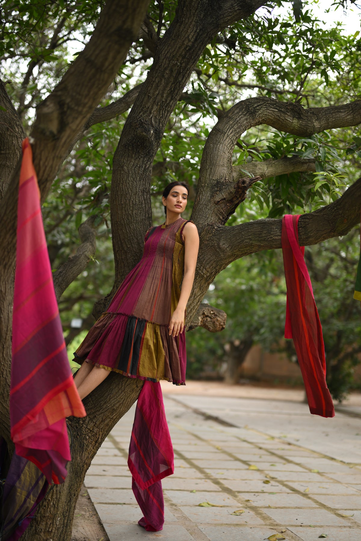 The Rang Rekha handwoven Narayanpet cotton dress in pink, maroon, mustard and black by Taram