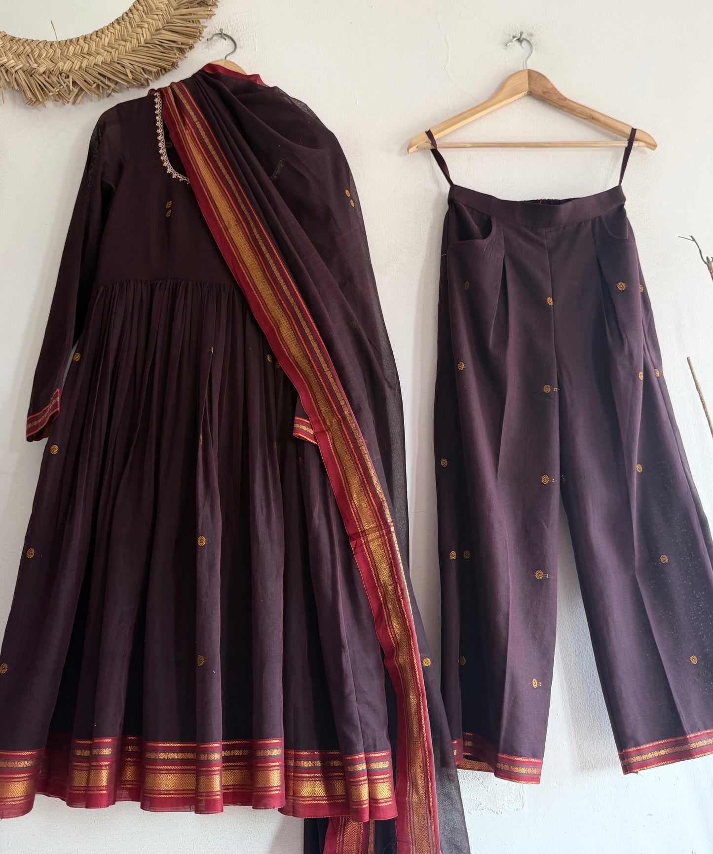 Maharani's Plum Kurtha Set – deep plum Narayanpet handloom kurtha with gold borders paired with matching bottoms and dupatta.