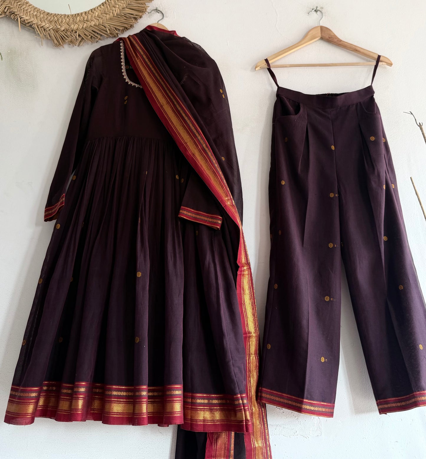 Maharani's Plum Kurtha Set – deep plum Narayanpet handloom kurtha with gold borders paired with matching bottoms and dupatta.