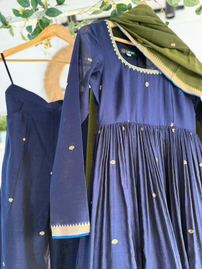 Midnight Blue Kurtha Set – deep navy handloom kurtha with subtle zari accents, matching bottoms, and coordinated dupatta displayed on hanger.