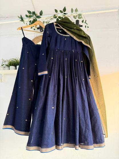 Midnight Blue Kurtha Set – deep navy handloom kurtha with subtle zari accents, matching bottoms, and coordinated dupatta displayed on hanger.