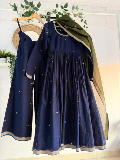 Midnight Blue Kurtha Set – deep navy handloom kurtha with subtle zari accents, matching bottoms, and coordinated dupatta displayed on hanger.
