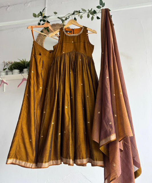 Golden Blush Narayanpet Kurta Set featuring mustard kurta, flared sharara bottoms, and pastel peach dupatta.