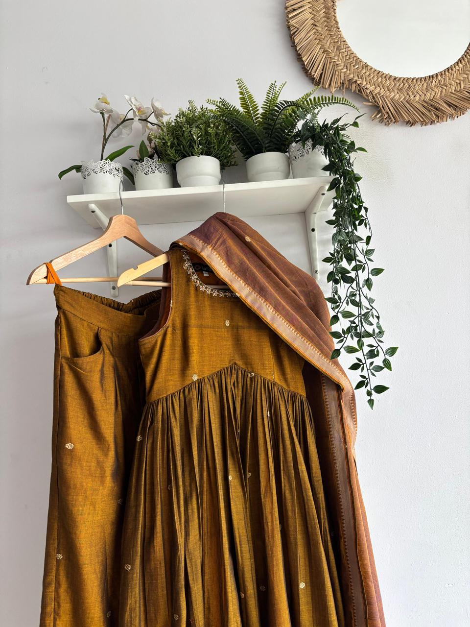 Golden Blush Narayanpet Kurta Set featuring mustard kurta, flared sharara bottoms, and pastel peach dupatta.